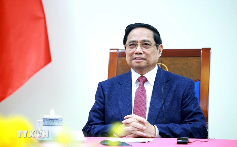 Thủ tướng Phạm Minh Chính điện đàm với Thủ tướng Singapore Lawrence Wong. (Ảnh: Dương Giang/TTXVN)
