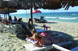 Far from the madding crowd: Visitors at An Bang beach sunbathe and enjoy the clean blue sea.