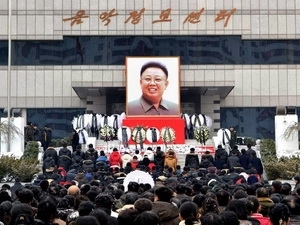 DPRK people pay tribute to Leader Kim Jong-il in Pyongyang on Dec. 21 