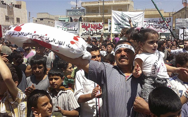 Dân thường chính là những nạn nhân đau khổ trong cuộc xung đột phe phái đẫm máu tại Syria 