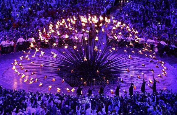 The stems lit by seven young athletes raise to form the Olympic Cauldron during the opening ceremony of the London 2012 Olympic Games.