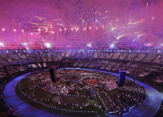 Fireworks explode over the Olympic Stadium during the opening ceremony of the London 2012 Olympic Games.