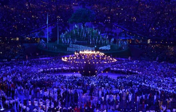 The Olympic Flame is lit during the opening ceremony of the London 2012 Olympic Games.