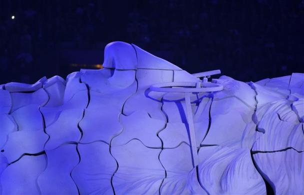 A giant model of a portrait of John Lennon is made with panels carried by performers during the closing ceremony of the London 2012 Olympic Games at the Olympic Stadium August 12, 2012.