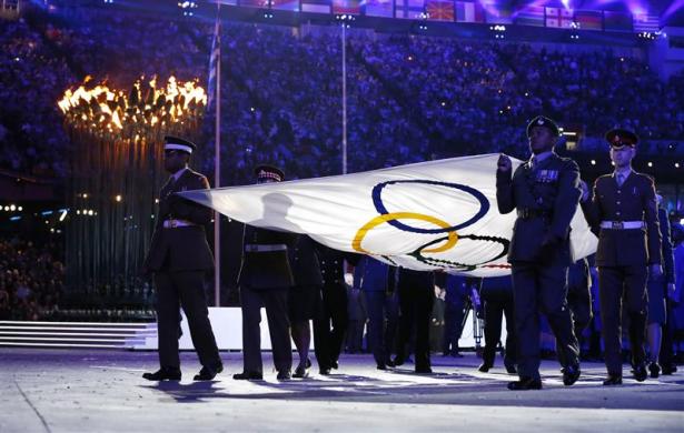 The Olympic flag is lowered at the closing ceremony of the London 2012 Olympic Games at the Olympic Stadium August 12, 2012.