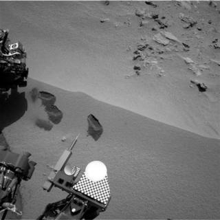 Three bite marks left in the Martian ground by the scoop on the robotic arm of NASA's Mars rover Curiosity are pictured in this October 15, 2012 NASA handout photo obtained by Reuters October 20, 2012. 