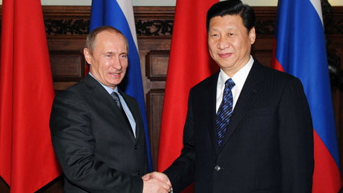 Tổng thống Nga V. Putin và Chủ tịch Trung Quốc Tập Cận Bình (phải)