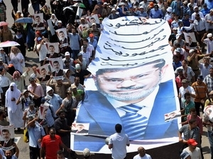 Tuần hành ủng hộ Tổng thống bị phế truất Mohamed Morsi tại Cairo. (Nguồn: AFP/TTXVN)