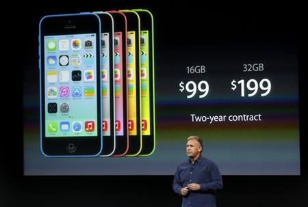 Phil Schiller, senior vice president of worldwide marketing for Apple Inc, talks about the pricing of the new iPhone 5C at Apple Inc's media event in Cupertino, California September 10, 2013. 