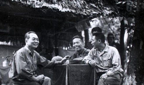 General Vo Nguyen Giap, Lieutenant General Dong Sy Nguyen, and commissar Dang Tin (rightmost) at another shack in the forest situated along the Ho Chi Minh Trail.