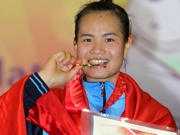 Nguyễn Thị Yến giành huy chương vàng SEA Games 27. (Ảnh: TTXVN)