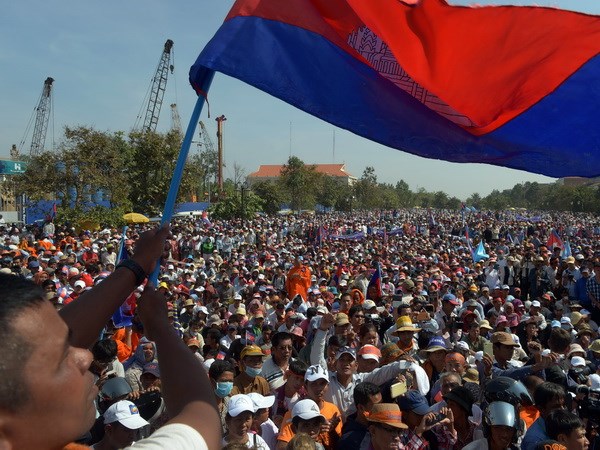 Mittinh, tuần hành ở trung tâm thủ đô Phnom Penh ngày 10/12. (Nguồn: AFP/TTXVN)