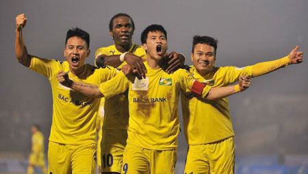 Overjoyed: Song Lam Nghe An players celebrate their win 6-1 over Quang Nam in the second round of the V-League 2014 yesterday. 