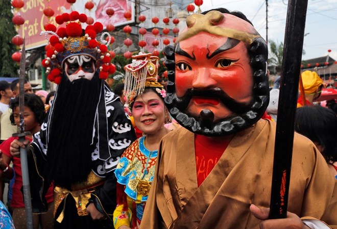 Người dân hóa trang thành các vị thần để tham gia một cuộc diễu hành truyền thống có tên gọi