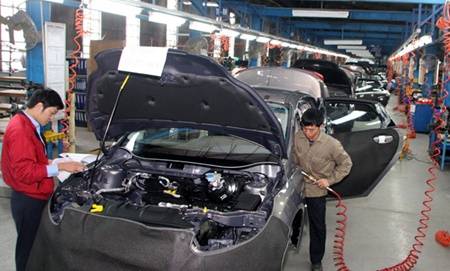 Workers assemble sedans at Ford Viet Nam in the northern province of Hai Duong. The processing and manufacturing sector grew strongly in January. 