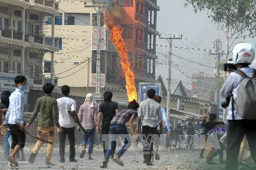   Xung đột leo thang tại Phnom Penh tháng 1/2014. (Nguồn: AFP/TTXVN)