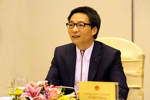 Deputy PM Vu Duc Dam chairs a conference with the National Committee on Aging, Ha Noi, March 1, 2014 
