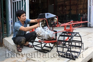 Farmer Bui Van Toi and his home-made plough 