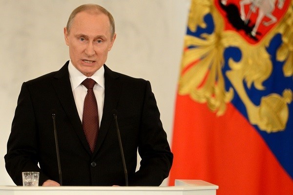 Tổng thống Nga Vladimir Putin đọc thông điệp liên bang về việc sáp nhập Crimea vào Liên bang Nga (Nguồn: AFP/TTXVN)