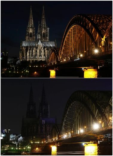The UNESCO World Heritage Cologne Cathedral and the Hohenzollern railway bridge along the river Rhine, are seen during and before (top) Earth Hour