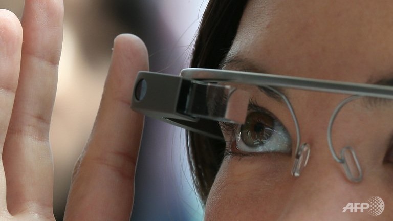 An attendee tries Google Glass during the Google I/O developer conference in San Francisco, California, May 17, 2013.  