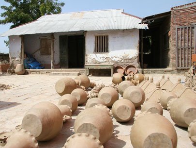 Pottery items are sun-dried before being burned in a kiln 