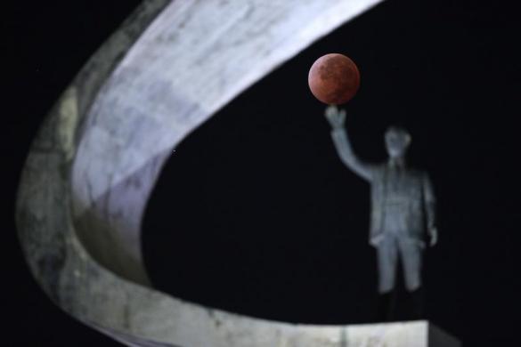 The moon in eclipse in Brasilia, Brazil, April 15, 2014. 