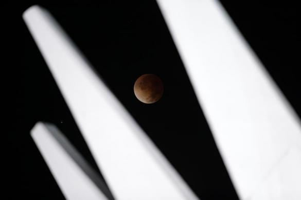 The moon is shown in eclipse in Brasilia, April 15, 2014.  