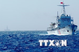 China moves oil rig, still in Vietnam's waters