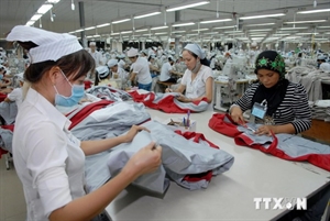 Workers at a garment-textile firm 