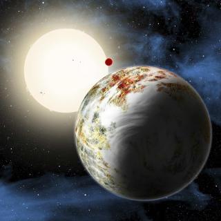 The newly discovered ''mega-Earth'' Kepler-10c dominates the foreground in this artist's conception released by the Harvard-Smithsonian Center for Astrophysics in Cambridge, Massachusetts on June 2, 2014. 