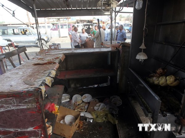 Hiện trường một vụ đánh bom xe tại Baghdad. (Ảnh: AFP/TTXVN)