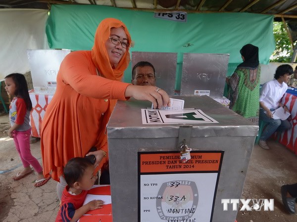 Cử tri Indonesia đi bầu cử. (Nguồn: AFP/TTXVN)