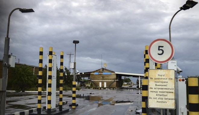 Một trạm kiểm soát biên giới Nga-Ukraine ở Donetsk thuộc Nga đóng cửa sau vụ nã pháo. (Nguồn: RIA Novosti)