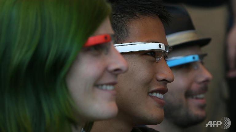 People wearing Google Glass.