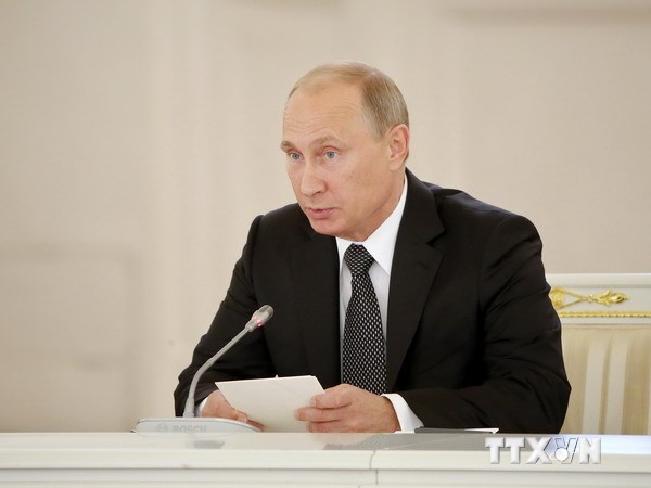 Tổng thống Nga Vladimir Putin chủ trì cuộc họp chính phủ tại điện Kremlin ở thủ đô Moskva ngày 18/9. (Nguồn: AFP/TTXVN)