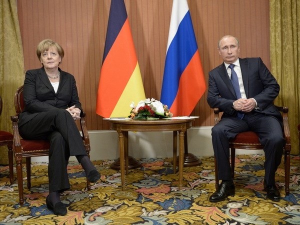 Thủ tướng Đức Angela Merkel và Tổng thống Nga Vladimir Putin. (Nguồn: ITAR-TASS)