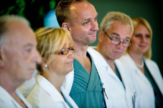 Professor Mats Brannstrom (C), head of a medical team which performed its first uterus transplant on a patient, attends a news conference about the procedure at the Sahlgreska University Hospital in Gothenburg September 18, 2012.