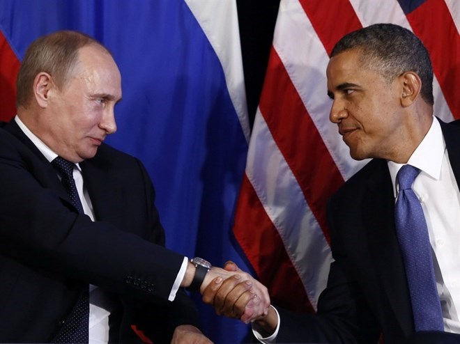 Tổng thống Mỹ Obama (phải) và Tổng thống Nga Putin có thể gặp nhau khi dự Hội nghị APEC. (Nguồn: Reuters)