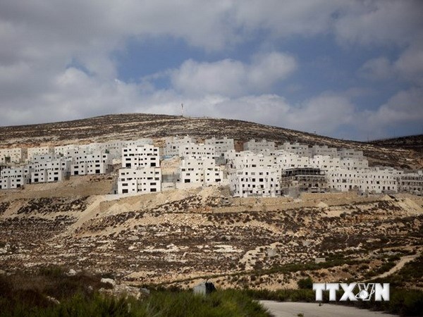 Công trình xây dựng khu định cư mới ở Givat Zeev, Khu Bờ tây, phía bắc Jerusalem. (Nguồn: AFP/TTXVN)