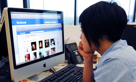 An internet user is surfing facebook. Viet Nam is among the top 10 countries with the maximum facebook users. 