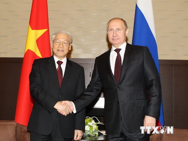 Tổng thống Liên bang Nga Vladimir Putin đón Tổng Bí thư Nguyễn Phú Trọng. (Ảnh: TTXVN)