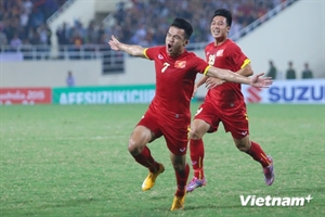 Midfielder Ngo Hoang Thinh (front) celebrates his goal.