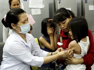 Children receive measles-rubella shots at Ho Chi Minh City-based Pasteur hospital