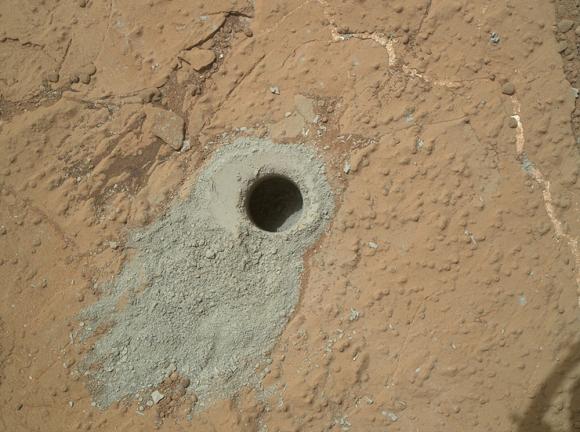 NASA's Mars rover Curiosity drilled into this rock target, ''Cumberland,'' during the 279th Martian day, or sol, of the rover's work on Mars, on May 19, 2013 and collected a powdered sample of material from the rock's interior, in this handout photo provided by NASA .