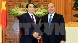 Deputy PM receives Laos' provincial delegation