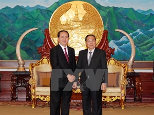 Minister of Public Security Tran Dai Quang received by Lao Party General Secretary and President Choummaly Sayasone 