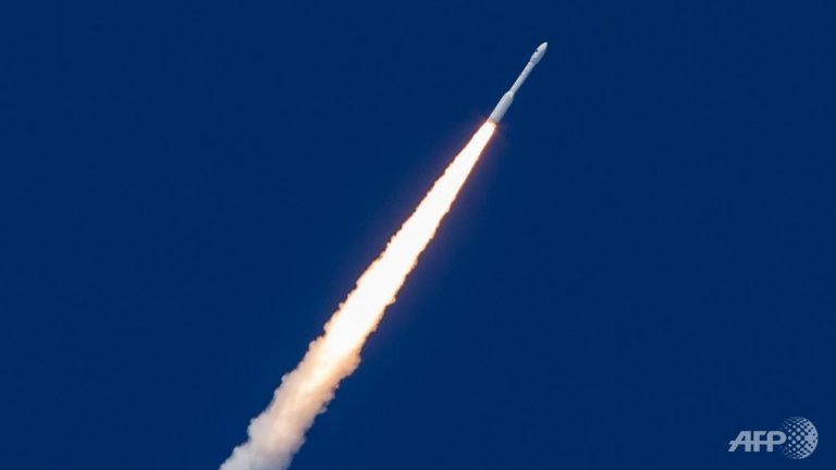 A Vega rocket lifts off from the ESA's base in Kourou, French Guiana on Feb 11, 2015, bearing the Intermediate eXperimental Vehicle (IXV) on a 100-minute test mission. 