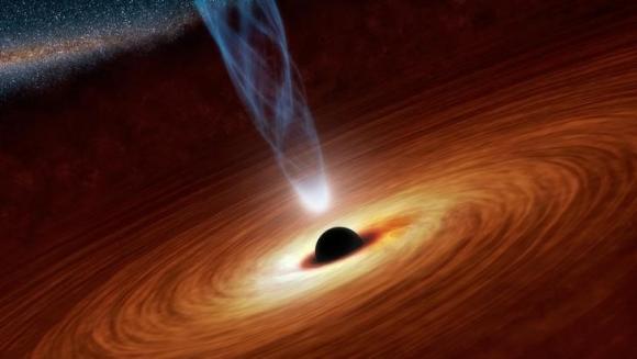  An artist's illustration shows a supermassive black hole with millions to billions times the mass of our sun at the center, surrounded by matter flowing onto the black hole in what is termed an accretion disk in this NASA illustration released on February 27, 2013. 