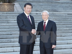 General Secretary of the Communist Party of China and President Xi Jinping (L) welcomes Party General Secretary Nguyen Phu Trong.